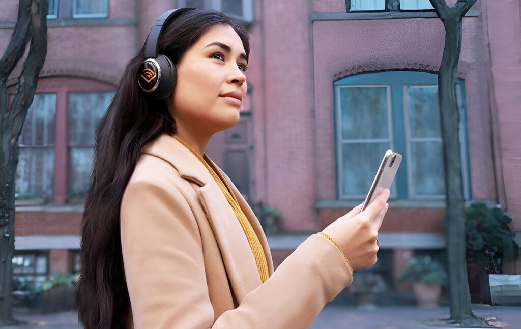 photo of a woman listening to an audiobook from Audible