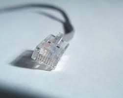 Connect one end of the phone cable.