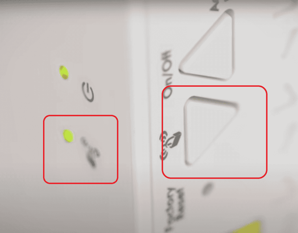 Find the WPS button and press it once