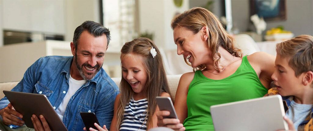 photo of a happy family at home using Ziply Fiber