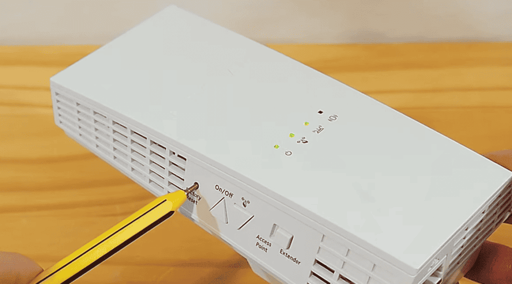 Press and hold the reset button